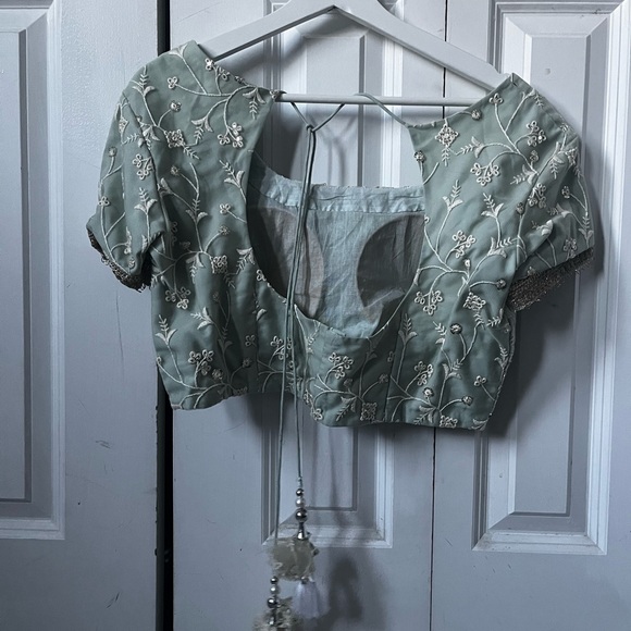 Turquoise Net Embroidered Lehenga Choli - Picture 4 of 9